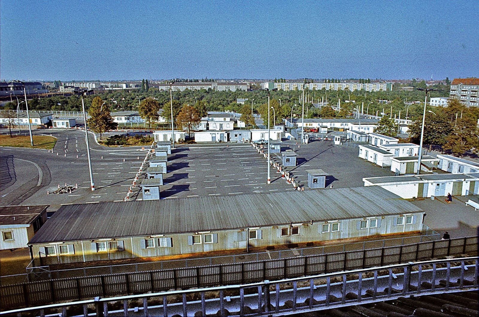 Overhead view of the border crossing with control buildings, barriers and the steel Bösebrücke