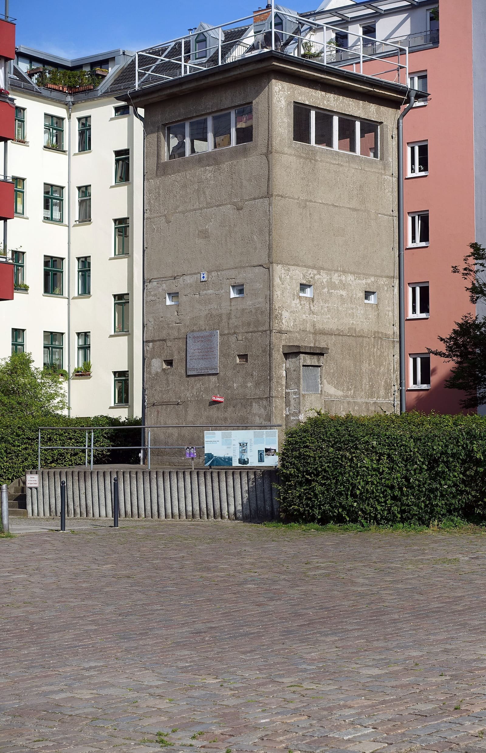 A square concrete former border watchtower with an observation level at the top, now a memorial to Günter Litfin.